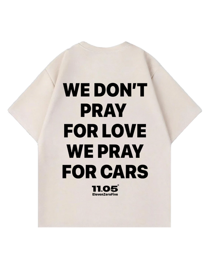 'We don't pray for love we pray for cars' Oversized T-Shirt