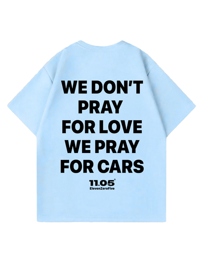 'We don't pray for love we pray for cars' Oversized T-Shirt